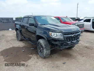 2019 Chevrolet Colorado 4WD ZR2 z VIN 1GCGTEEN5K1302629, wystawiony jako IAAI lot #42127112 z przebiegiem 137 120 mil mil oraz . Historia ofert i sprzedaży dostępna na DreamBid. Obrazek 1.