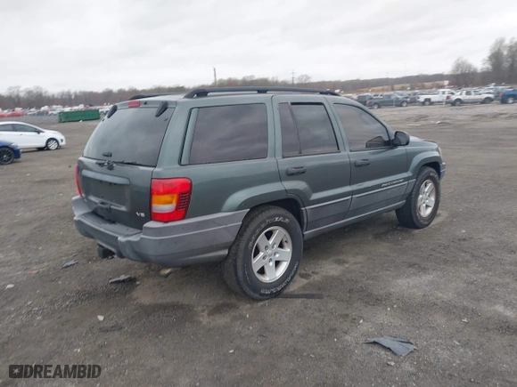 2002 Jeep Grand Cherokee Laredo with VIN 1J4GW48NX2C151430, listed as a IAAI auction lot 41886769 with 222,795 mi miles. Bid and sale history available at carsss.com. Image 4.