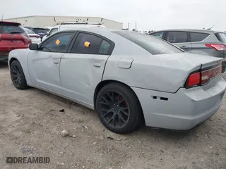 2011 Dodge Charger SE with VIN 2B3CL3CG7BH614882, listed as a IAAI auction lot 41953583 with 195,428 mi miles. Bid and sale history available at carsss.com. Image 3.