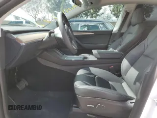 2022 Tesla Model Y Long Range with VIN 7SAYGDEE3NF558379, listed as a Copart auction lot 48594035 with 12,501 mi miles and Salvage Title. Bid and sale history available at carsss.com. Image 7.