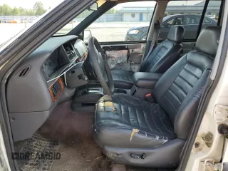 1996 Jeep Grand Cherokee Laredo z VIN 1J4EX58S3TC144191, wystawiony jako Copart lot #53153495 z przebiegiem 197 853 mil mil oraz Szkoda całkowita • Salvage title. Historia ofert i sprzedaży dostępna na DreamBid. Obrazek 7.