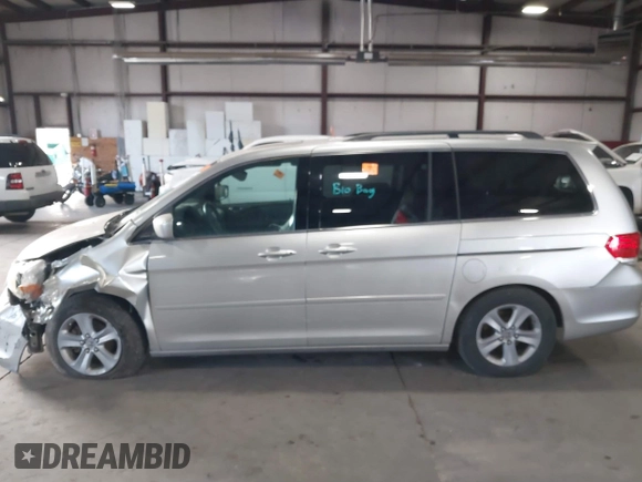 2009 Honda Odyssey Touring с VIN 5FNRL38979B005813, выставлен на аукционе IAAI как лот 41049383 с пробегом 174 897 миль миль и . История ставок и продаж доступна на DreamBid. Изображение 14.