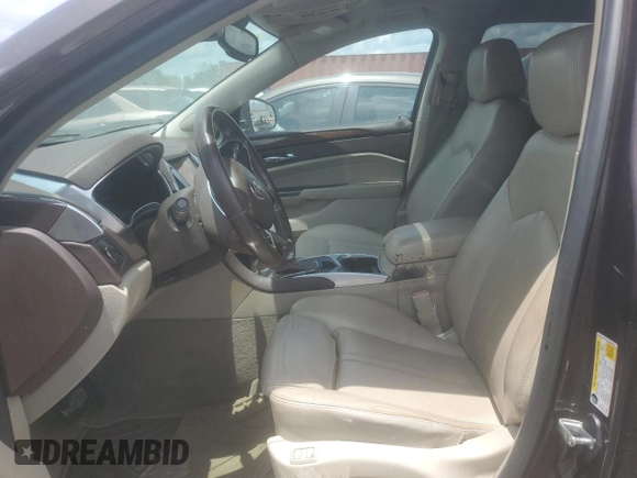 2016 Cadillac SRX Luxury Collection with VIN 3GYFNBE31GS555787, listed as a Copart auction lot 64289525 with 156,528 mi miles and Clean title. Bid and sale history available at DreamBid. Image 7.