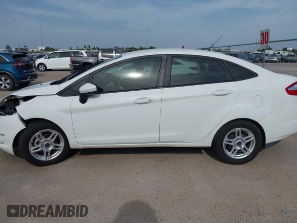 2017 Ford Fiesta SE z VIN 3FADP4BJ1HM126375, wystawiony jako IAAI lot #42244318 z przebiegiem 70 829 mil mil oraz . Historia ofert i sprzedaży dostępna na DreamBid. Obrazek 15.
