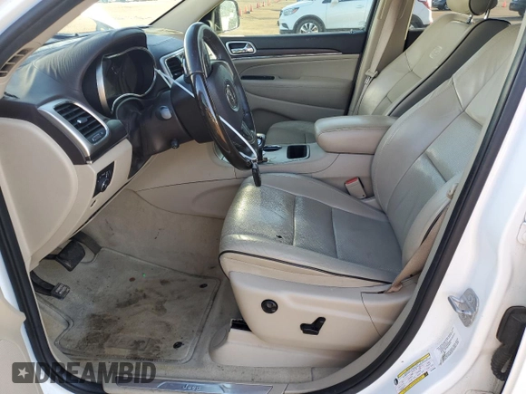 2014 Jeep Grand Cherokee Overland with VIN 1C4RJECGXEC529438, listed as a Copart auction lot 45693285 with 154,674 mi miles and Salvage Title. Bid and sale history available at carsss.com. Image 7.
