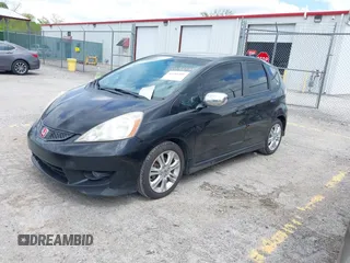 2010 Honda Fit Sport z VIN JHMGE8G45AS020143, wystawiony jako IAAI lot #42161201 z przebiegiem 176 800 mil mil oraz . Historia ofert i sprzedaży dostępna na DreamBid. Obrazek 2.