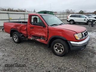 2000 Nissan Frontier XE z VIN 1N6DD21S8YC338304, wystawiony jako Copart lot #83990454 z przebiegiem 184 467 mil mil oraz Szkoda całkowita • Salvage title. Historia ofert i sprzedaży dostępna na DreamBid. Obrazek 4.