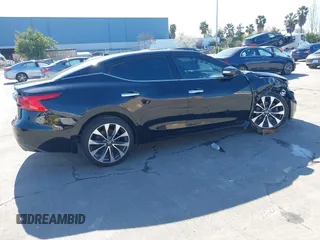 2016 Nissan Maxima SL with VIN 1N4AA6AP9GC448087, listed as a IAAI auction lot 41828781 with 99,436 mi miles and . Bid and sale history available at DreamBid. Image 4.