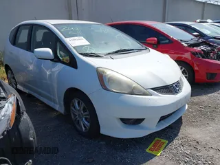2011 Honda Fit Sport z VIN JHMGE8H61BC026047, wystawiony jako IAAI lot #42082080 z przebiegiem 140 257 mil mil oraz . Historia ofert i sprzedaży dostępna na DreamBid. Obrazek 1.