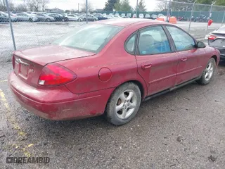 2001 Ford Taurus SES with VIN 1FAFP55U11A283914, listed as a IAAI auction lot 41110448 with 169,017 mi miles. Bid and sale history available at carsss.com. Image 4.
