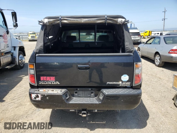 2006 Honda Ridgeline RTL with VIN 2HJYK16596H566552, listed as a Copart auction lot 57516525 with 192,023 mi miles and Salvage Title. Bid and sale history available at DreamBid. Image 6.