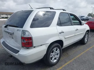 2004 Acura MDX Touring Pkg w/Navigation with VIN 2HNYD18834H520180, listed as a IAAI auction lot 41934124 with 201,817 mi miles. Bid and sale history available at carsss.com. Image 4.