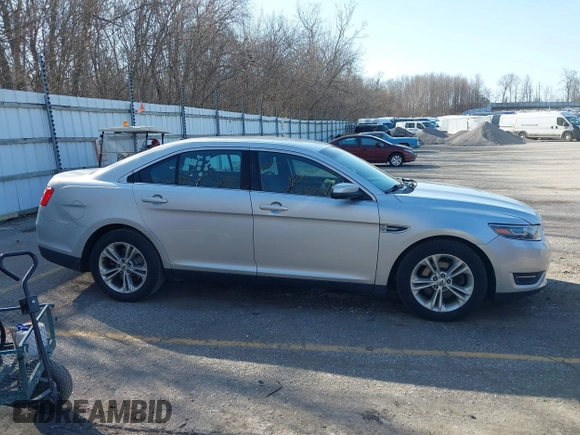 2013 Ford Taurus SEL with VIN 1FAHP2E8XDG191132, listed as a IAAI auction lot 41833542 with 165,125 mi miles. Bid and sale history available at carsss.com. Image 13.