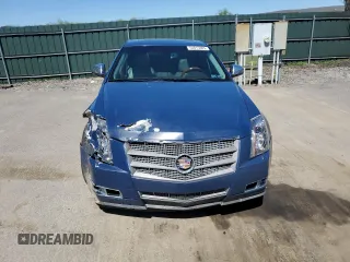 2009 Cadillac CTS AWD with VIN 1G6DH577390123365, listed as a Copart auction lot 54815885 with 141,026 mi miles and Salvage Title. Bid and sale history available at DreamBid. Image 5.