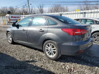 2016 Ford Focus SE with VIN 1FADP3F23GL384944, listed as a Copart auction lot 49876395 with 74,087 mi miles and Salvage title. Bid and sale history available at DreamBid. Image 2.