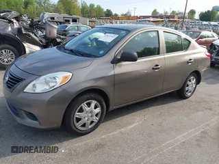 2014 Nissan Versa SV with VIN 3N1CN7AP4EL855526, listed as a IAAI auction lot 42011343 with 160,253 mi miles and . Bid and sale history available at DreamBid. Image 2.