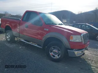 2005 Ford F-150 XL with VIN 1FTRF14W05NA77908, listed as a IAAI auction lot 41382643 with 128,135 mi miles. Bid and sale history available at carsss.com. Image 1.
