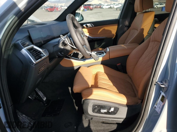 2025 BMW X5 sDrive40i with VIN 5UX13EU09S9X71671, listed as a Copart auction lot 42515055 with 2,695 mi miles and Salvage Title. Bid and sale history available at carsss.com. Image 7.