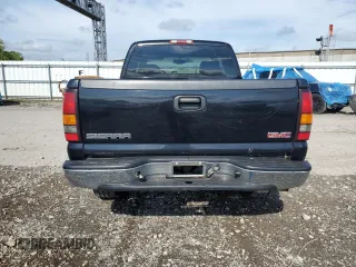 2004 GMC Sierra 1500 SLE with VIN 1GTEK19T54E305571, listed as a Copart auction lot 56954375 with 174,649 mi miles and Salvage title. Bid and sale history available at DreamBid. Image 6.