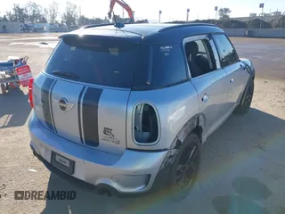 2013 MINI Countryman S ALL4 with VIN WMWZC5C58DWP30774, listed as a IAAI auction lot 41637209 with 101,540 mi miles and . Bid and sale history available at DreamBid. Image 4.