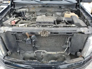 2009 Ford F-150 STX with VIN 1FTRF04W49KB36525, listed as a Copart auction lot 47117575 with 106,291 mi miles and Salvage title. Bid and sale history available at DreamBid. Image 11.