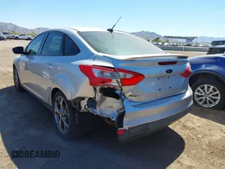 2014 Ford Focus SE with VIN 1FADP3F25EL199002, listed as a IAAI auction lot 41872781 with 150,548 mi miles. Bid and sale history available at carsss.com. Image 3.
