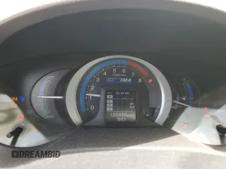 2010 Honda Insight EX with VIN JHMZE2H74AS032878, listed as a Copart auction lot 56230795 with 125,838 mi miles and Clean title. Bid and sale history available at DreamBid. Image 9.
