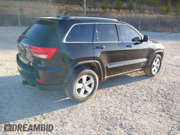 2012 Jeep Grand Cherokee Laredo with VIN 1C4RJFAG3CC246577, listed as a IAAI auction lot 41807693 with 164,574 mi miles. Bid and sale history available at carsss.com. Image 4.