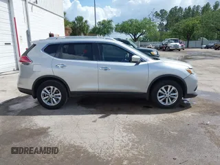 2015 Nissan Rogue S with VIN KNMAT2MT1FP502091, listed as a IAAI auction lot 41940559 with 360,915 mi miles and . Bid and sale history available at DreamBid. Image 13.