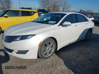 2013 Lincoln MKZ with VIN 3LN6L2G97DR822023, listed as a IAAI auction lot 41856396 with 129,056 mi miles and . Bid and sale history available at DreamBid. Image 2.