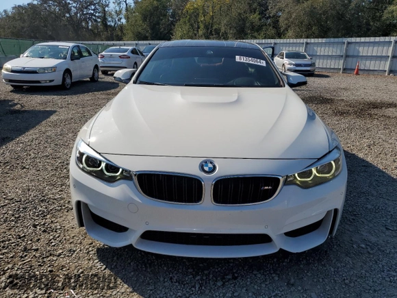 2019 BMW M4 with VIN WBS4Y9C51KAG67058, listed as a Copart auction lot 81354064 with 63,350 mi miles and Salvage Title. Bid and sale history available at carsss.com. Image 5.