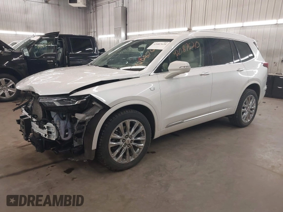 2022 Cadillac XT6 Premium Luxury with VIN 1GYKPDRS3NZ131095, listed as a IAAI auction lot 42087620 with 36,740 mi miles and . Bid and sale history available at DreamBid. Image 2.