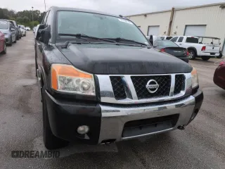 2010 Nissan Titan LE with VIN 1N6BA0EC8AN318538, listed as a Copart auction lot 74122194 with Not Provided miles and Salvage Title. Bid and sale history available at carsss.com. Image 5.