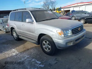 1999 Toyota Land Cruiser with VIN JT3HT05J2X0038906, listed as a IAAI auction lot 41245814 with 1 mi miles. Bid and sale history available at carsss.com. Image 1.