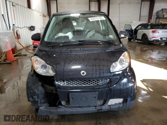 2012 Smart fortwo Pure z VIN WMEEJ3BA3CK570191, wystawiony jako Copart lot #43576165 z przebiegiem 80 511 mil mil oraz Szkody całkowita. Historia ofert i sprzedaży dostępna na DreamBid. Obrazek 5.