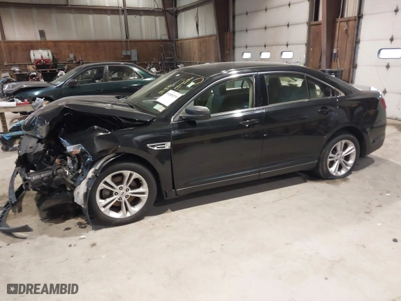 2015 Ford Taurus SE with VIN 1FAHP2D91FG160025, listed as a IAAI auction lot 41205271 with 164,552 mi miles. Bid and sale history available at carsss.com. Image 17.