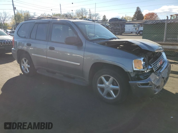 2007 GMC Envoy SLE with VIN 1GKDT13S472288894, listed as a Copart auction lot 78476374 with 147,806 mi miles and Salvage Title. Bid and sale history available at carsss.com. Image 4.