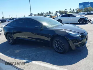 2019 Tesla Model 3 Mid Range z VIN 5YJ3E1EA5KF306816, wystawiony jako IAAI lot #41710916 z przebiegiem 76 222 mil mil oraz . Historia ofert i sprzedaży dostępna na DreamBid. Obrazek 13.