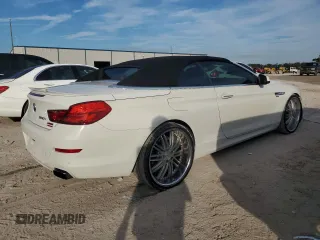 2012 BMW 6 Series 650i z VIN WBALZ3C56CDL72058, wystawiony jako Copart lot #43246815 z przebiegiem 133 048 mil mil oraz Tytuł czysty. Historia ofert i sprzedaży dostępna na DreamBid. Obrazek 3.
