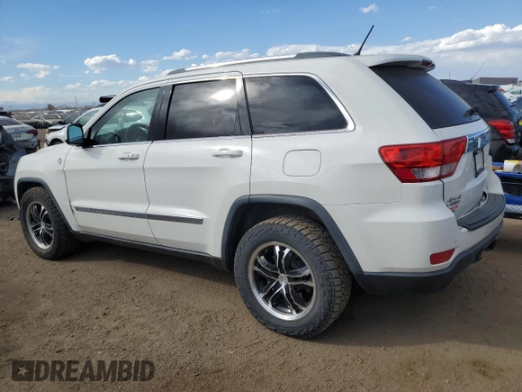 2011 Jeep Grand Cherokee Laredo with VIN 1J4RR4GG8BC718852, listed as a Copart auction lot 49852535 with 101,945 mi miles and Salvage Title. Bid and sale history available at carsss.com. Image 2.