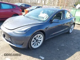 2022 Tesla Model 3 Long Range with VIN 5YJ3E1EB0NF365284, listed as a IAAI auction lot 41899706 with 36,463 mi miles and . Bid and sale history available at DreamBid. Image 2.