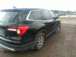 2021 Honda Pilot EX-L with VIN 5FNYF5H50MB011165, listed as a IAAI auction lot 39799892 with 95,040 mi miles and . Bid and sale history available at DreamBid. Image 4.