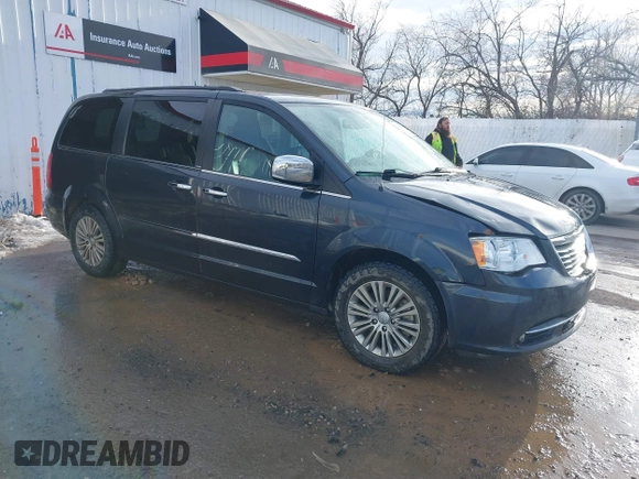2014 Chrysler Town & Country Touring-L with VIN 2C4RC1CG4ER330072, listed as a IAAI auction lot 41533640 with 131,253 mi miles. Bid and sale history available at carsss.com. Image 1.