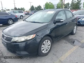 2012 Kia Forte EX with VIN KNAFU4A28C5490102, listed as a IAAI auction lot 42164395 with 167,444 mi miles. Bid and sale history available at carsss.com. Image 2.