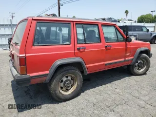 1996 Jeep Cherokee SE with VIN 1J4FT28S3TL213153, listed as a Copart auction lot 57217625 with 331,741 mi miles and Salvage title. Bid and sale history available at DreamBid. Image 3.