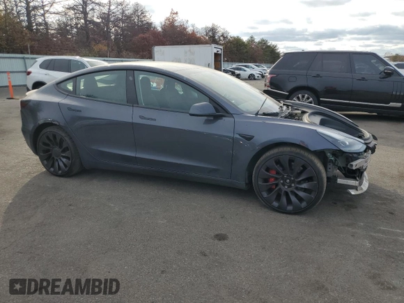 2023 Tesla Model 3 Performance z VIN 5YJ3E1EC4PF488873, wystawiony jako Copart lot #78991994 z przebiegiem 26 452 mil mil oraz Szkoda całkowita • Salvage title. Historia ofert i sprzedaży dostępna na DreamBid. Obrazek 4.