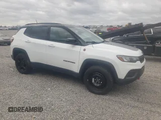2023 Jeep Compass Trailhawk with VIN 3C4NJDDN5PT565793, listed as a Copart auction lot 50060115 with 38,292 mi miles and Salvage title. Bid and sale history available at DreamBid. Image 4.