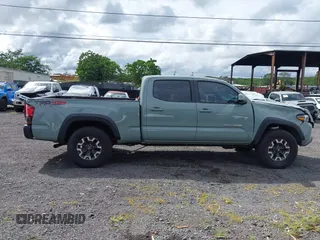 2023 Toyota Tacoma SR5 z VIN 3TYDZ5BNXPT024914, wystawiony jako IAAI lot #41302756 z przebiegiem 20 307 mil mil oraz . Historia ofert i sprzedaży dostępna na DreamBid. Obrazek 14.