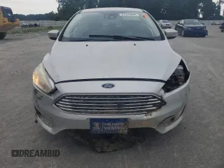 2017 Ford Focus Titanium with VIN 1FADP3N27HL251297, listed as a Copart auction lot 67373094 with 104,733 mi miles and Salvage Title. Bid and sale history available at carsss.com. Image 5.