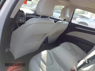 2017 Ford Fusion Hybrid Titanium с VIN 3FA6P0RU7HR148191, выставлен на аукционе IAAI как лот 42167708 с пробегом 72 708 миль миль и . История ставок и продаж доступна на DreamBid. Изображение 22.